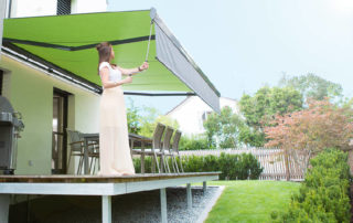 Reflexa Gelenkarmmarkise Suntigua Terrasse mit Kurbel