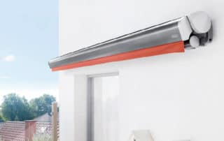 Reflexa Gelenkarmmarkise Suntigua an Wand montiert